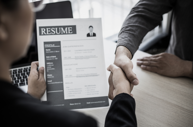 Stock Foto Handschlag mit Resume